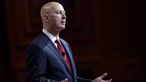Nebraska Gov. Pete Ricketts, seen here in 2018, is supporting Jim Pillen for governor. 