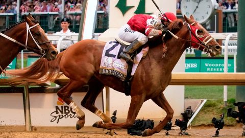 Rich Strike, with Sonny Leon aboard, crosses the finish line to win the 148th running of the Kentucky Derby at Churchill Downs Saturday, May 7, 2022, in Louisville, Kentucky.