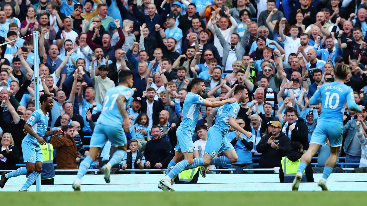 Aymeric Laporte celebrates with his teammates after scoring Manchester City's second goal against Newcastle United.