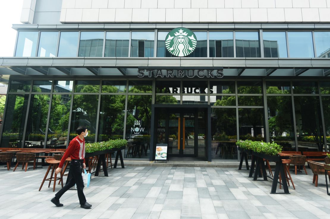 A pedestrian walking by a closed Starbucks outlet in Hangzhou in April.