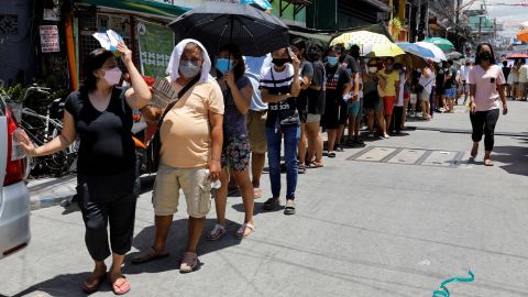 Filipinos line up to cast their ballots in Tondo, Metro Manila on May 9.