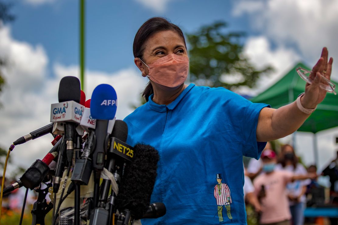 Vice President Leni Robredo speaks to the media after casting her vote at a school converted into a polling precinct on May 9, in Magarao, Camarines Sur province, Philippines. 