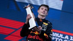 TOPSHOT - Red Bull Racing's Dutch driver Max Verstappen celebrates on the podium after winning the Miami Formula One Grand Prix at the Miami International Autodrome in Miami Gardens, Florida, on May 8, 2022. (Photo by Brendan Smialowski / AFP) (Photo by BRENDAN SMIALOWSKI/AFP via Getty Images)
