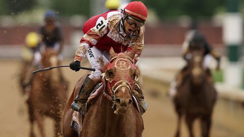 Jockey Sonny Leon rides long-shot Rich Strike over the finish line at the Kentucky Derby Saturday. 