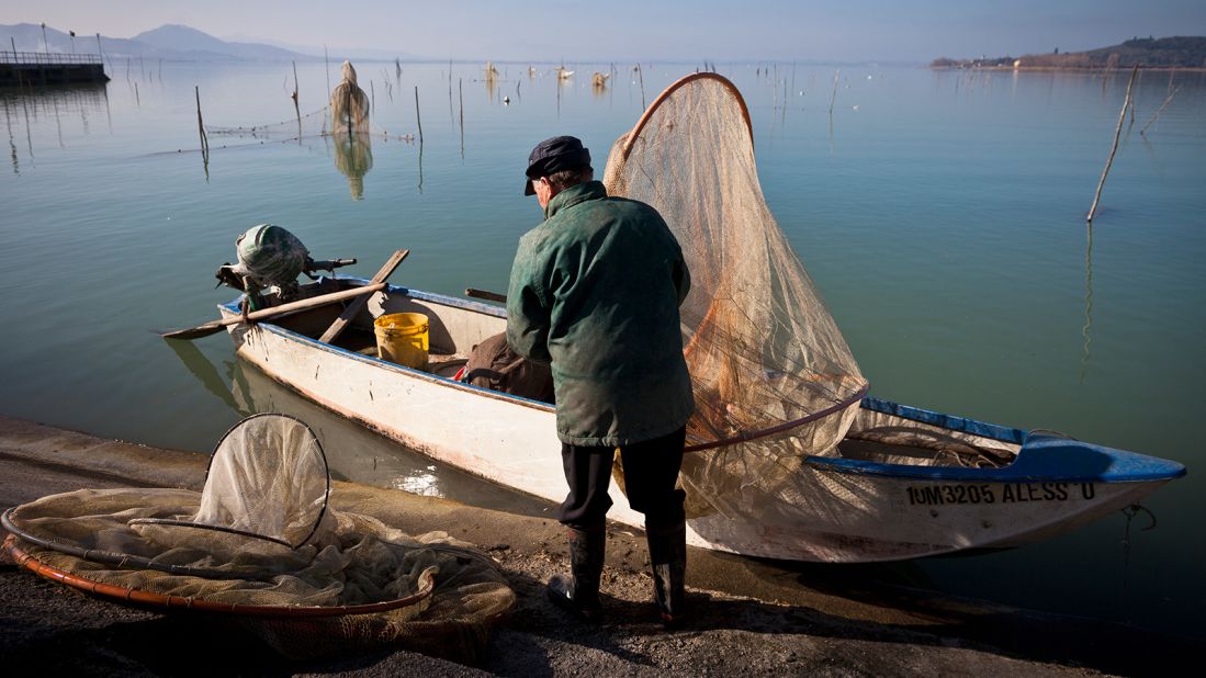 <strong>Lakeside life: </strong>Fishermen on Lake Trasimeno not only fish, but also cook and run a restaurant.