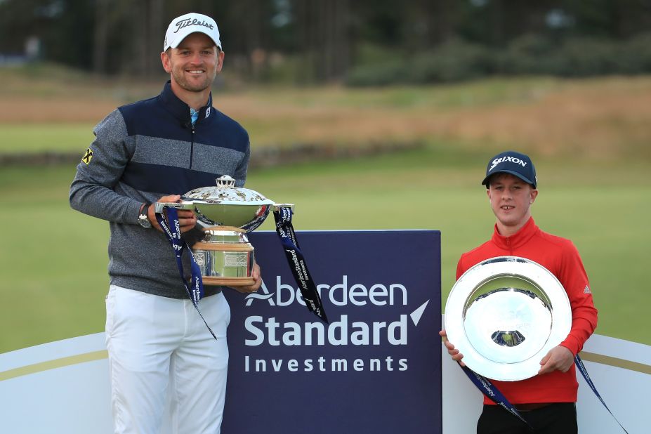 Born with Ellis-van Creveld syndrome, a genetic condition characterized by short limb dwarfism, Lawlor has no knuckles on the top of his fingers. The EDGA Scottish Open was the first of two disability events scheduled on the European Tour for 2019. Here, Lawlor poses with fellow winner Bernd Wiesberger.