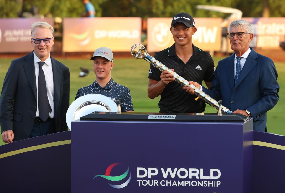 Lawlor and two-time major winner Collin Morikawa celebrate their DP Tour World Championship victories in Dubai in November 2021.