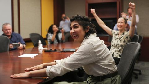 Cecilia Reyes, of the Chicago Tribune, reacts as she and Madison Hopkins of the Better Government Association, not pictured, win the Pulitzer Prize in Local Reporting at the Chicago Tribune's Freedom Center in Chicago, Monday, May 9, 2022.