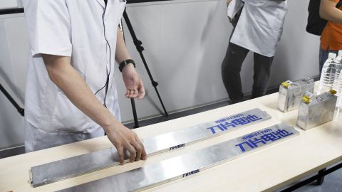 Many battery experts credit BYD for packing LFP cells more densely by removing packaging. Here a BYD battery is shown. (Photo by Kyodo News via Getty Images)