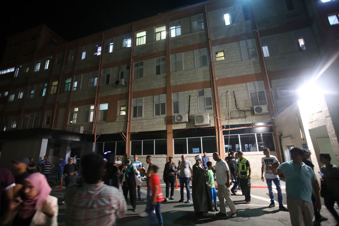 People gather in front of the Makassed Hospital on July 18, 2017.