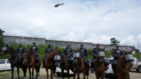 A helicopter flies over Social Bellavista prison as secuity forces remain on high alert outside the complex on Monday.