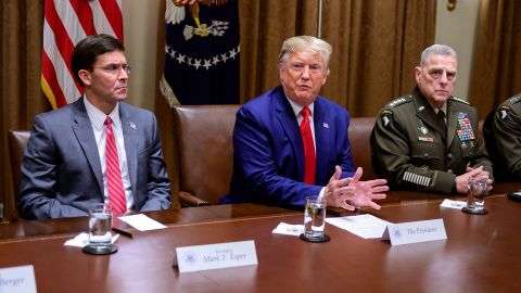 Then-President Donald J. Trump answers a reporter's question as he participates in a briefing with senior military leaders in the Cabinet Room of the White House in Washington, DC, on October 7, 2019. 