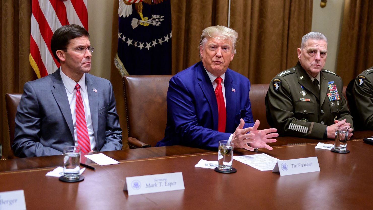 Then-President Donald J. Trump answers a reporter's question as he participates in a briefing with senior military leaders in the Cabinet Room of the White House in Washington, DC, on October 7, 2019. 