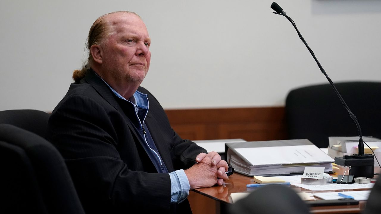 Celebrity chef Mario Batali listens to proceedings during the first day of his trial on an indecent assault and battery charge at the Boston Municipal Court Monday.