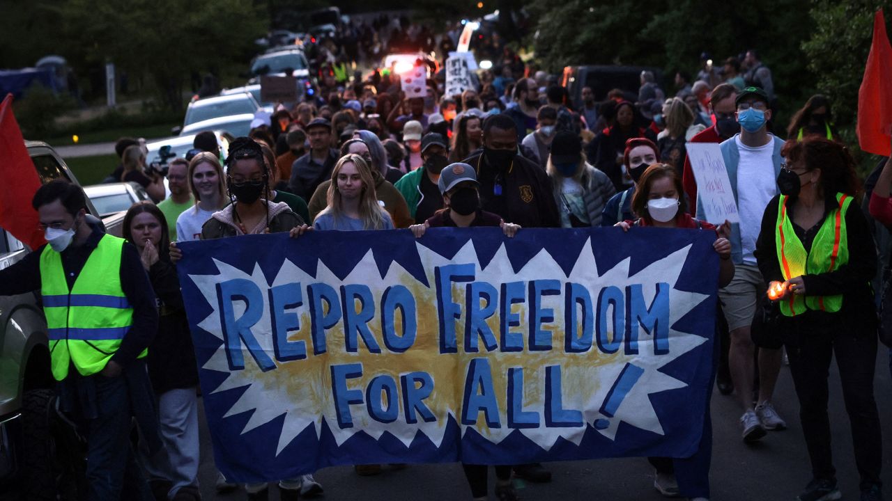 Demonstrators in support of reproductive rights march following a vigil outside Supreme Court Justice Samuel Alito's home in Alexandria, Virginia, May 9, 2022. 
