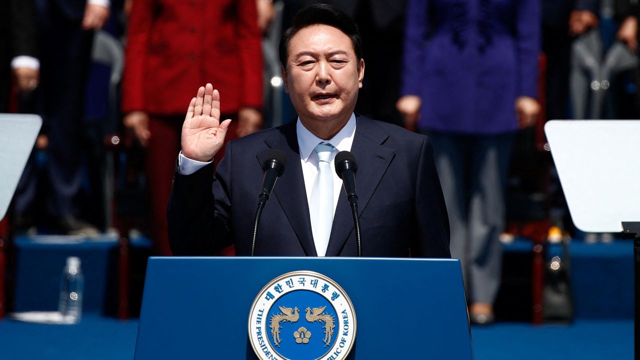 South Korean President Yoon Suk-yeol takes an oath during his inauguration in front of the National Assembly in Seoul, South Korea, May 10, 2022. Jeon Heon-Kyun /Pool via REUTERS