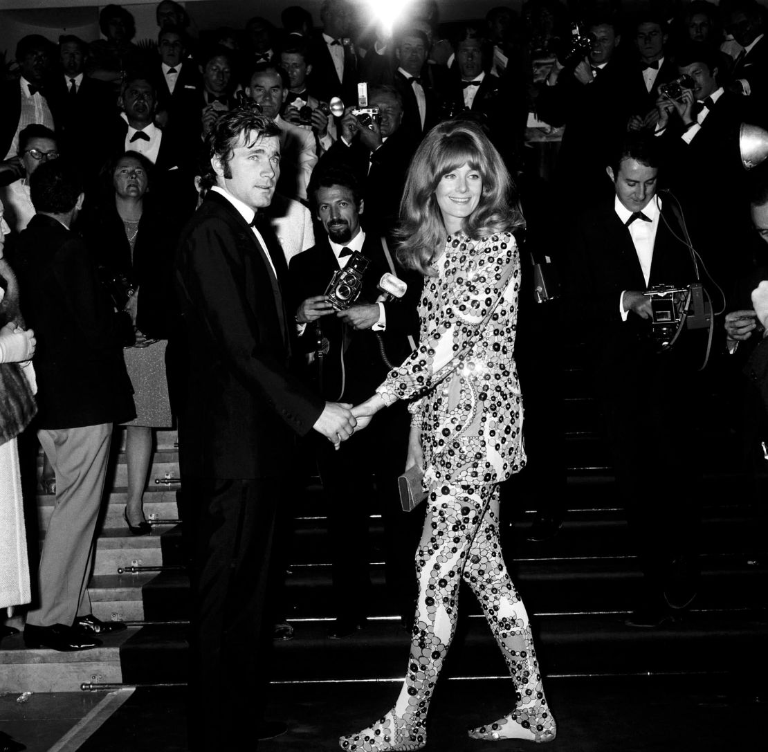 Vanessa Redgrave sports an intricate two piece as she's photographed with Italian actor Franco Nero at the premiere of her film "Blow Up" in 1967. 