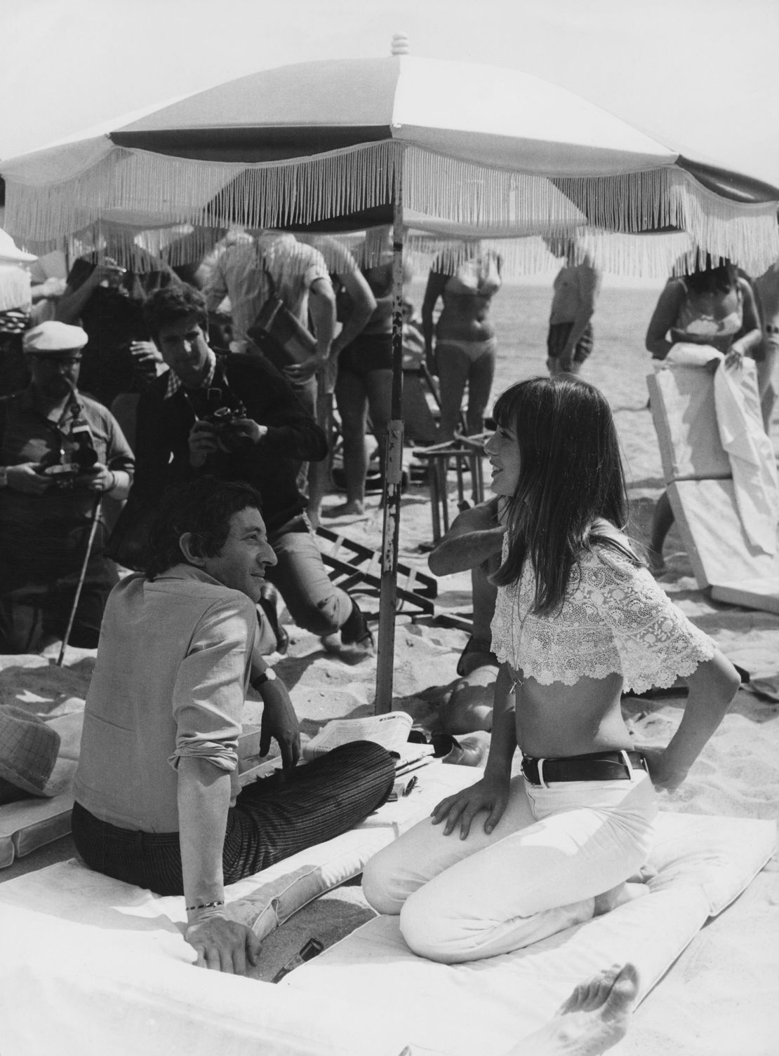 Away from the hustle and bustle of the red carpet Jane Birkin relaxes on the beach with her lover, French singer-songwriter Serge Gainsbourg. 