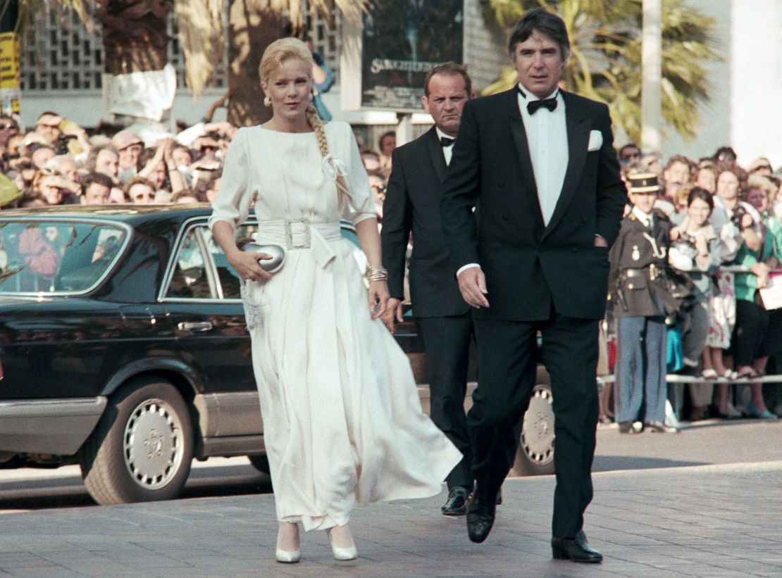 Monochrome pair French singer Sylvie Vartan, one of the most productive yé-yé artists, and her husband American producer Tony Scotti arrive in style at the Cannes festival in 1987.