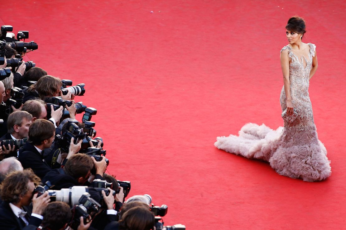 Eva Longoria arrives for the opening ceremony of the 65th Cannes film festival in Marchesa.