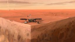 In this artist's concept of NASA's InSight lander on Mars, layers of the planet's subsurface can be seen below and dust devils can be seen in the background.