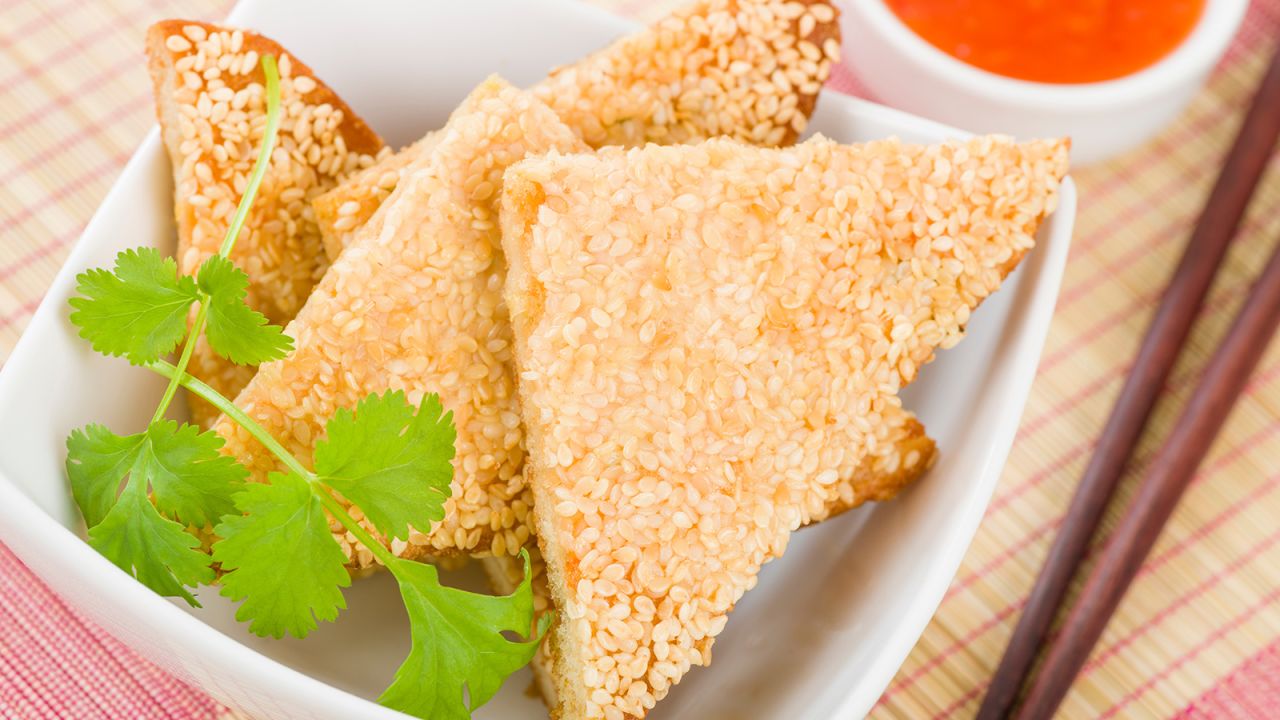 <strong>Prawn toast (Hong Kong):</strong> Also called shrimp toast, it is a simple savory snack consisting of shrimp paste smeared on white bread, then deep fried to a golden crisp. 