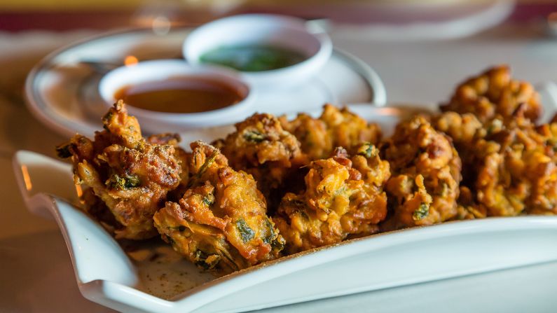 <strong>Pakora (India):</strong> Pakora is a catchall term for a variety of Indian vegetable fritters, which can be made with anything from potatoes and eggplant to cabbage and spinach as a base. 