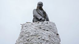 A monument of Taras Shevchenko, a Ukrainian poet and a national symbol, is covered with bags to protect it from Russian shelling in Kharkiv, Ukraine, Sunday, March 27, 2022. The bronze, 16-meter high monument was placed in 1935, survived WWII and is considered one of the world's best monuments to Shevchenko. 