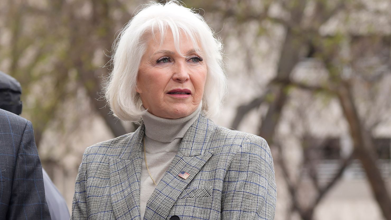 Mesa County (Colo.) Clerk Tina Peters talks to well-wishers at a rally staged to voice concerns about free and fair elections on the west steps of the State Capitol on April 5, 2022, in Denver. 