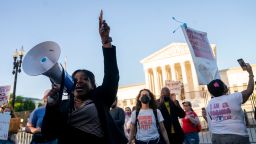 US Representative Cori Bush (L) (D-MO) joins abortion rights activists outside the US Supreme Court in Washington, DC, on May 10, 2022. (Photo by Stefani Reynolds / AFP) (Photo by STEFANI REYNOLDS/AFP via Getty Images)