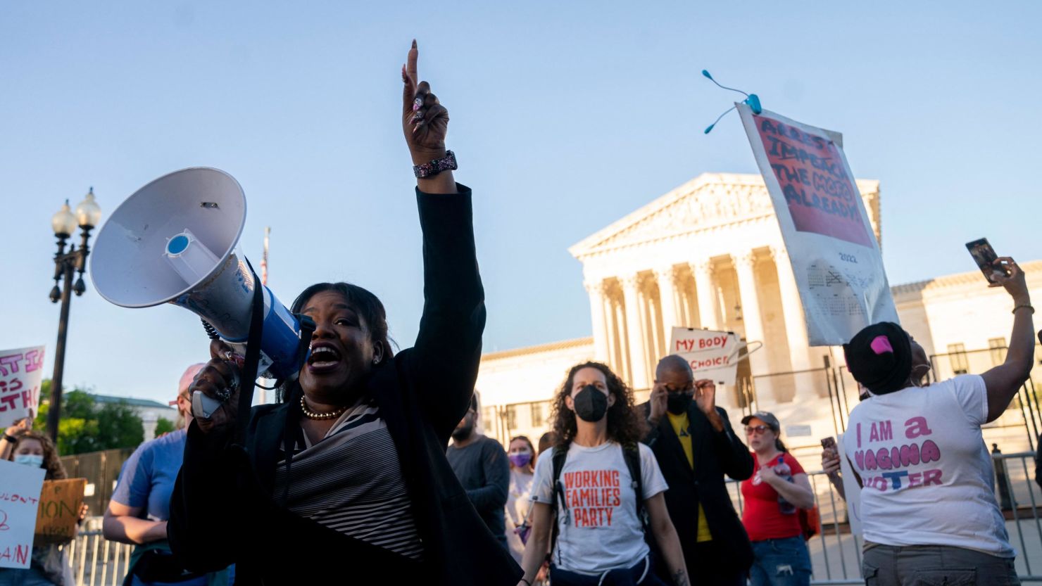 US Representative Cori Bush (L) (D-MO) joins abortion rights activists outside the US Supreme Court in Washington, DC, on May 10, 2022. (Photo by STEFANI REYNOLDS/AFP via Getty Images)