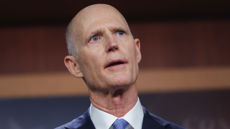 Rick Scott signed a law raising the age to buy a gun in Florida. But now he opposes doing …