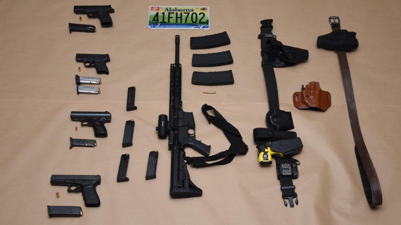 Indiana's Vanderburgh County Sheriff's Office released images of weapons it says were recovered from the crashed Cadillac.