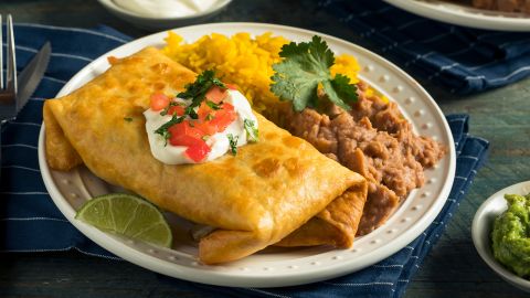A deep-fried beef chimichanga with rice and beans should hit the spot. Antacid optional.