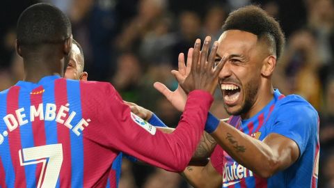 Obamayang (right) celebrates scoring against Celta.