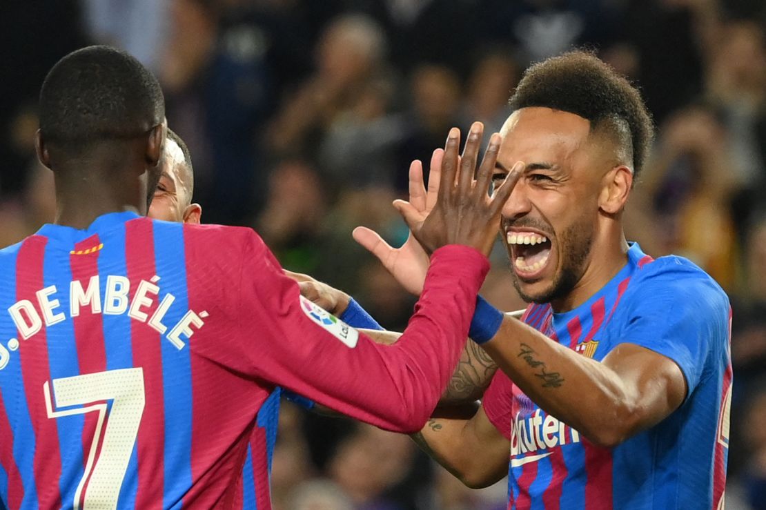 Aubameyang (right) celebrates scoring against Celta.