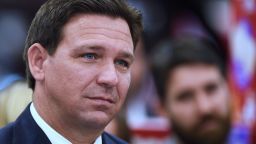 OCALA, FLORIDA, UNITED STATES - 2022/05/06: Florida Governor Ron DeSantis listens to a speaker at a press conference at Samâs Club in Ocala, where he signed into law more than $1.2 billion in tax relief for Floridians, the largest tax relief package in Floridaâs history. In an effort to combat inflation, taxes will be eliminated for varying periods of time on goods including fuel, childrenâs books, diapers, and home improvement items. (Photo by Paul Hennessy/SOPA Images/LightRocket via Getty Images)