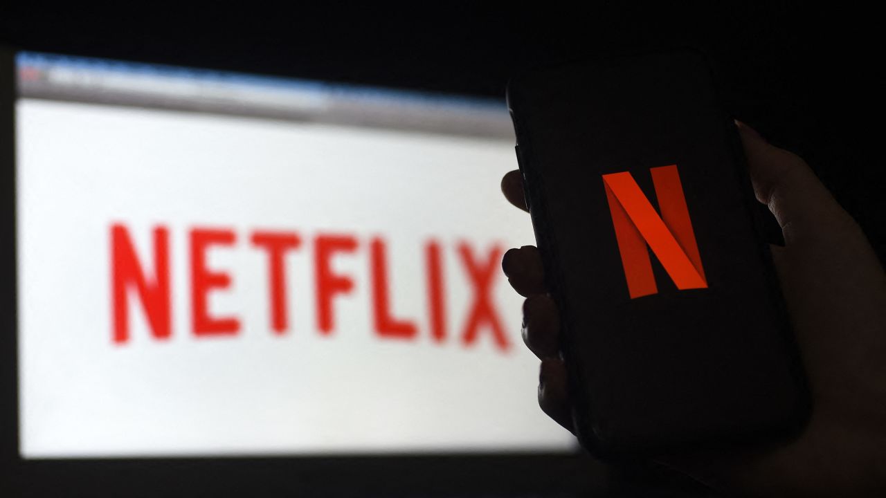 In this photo illustration a computer and a mobile phone screen display the Netflix logo on March 31, 2020 in Arlington, Virginia. - According to Netflix chief content officer Ted Sarandos, Netflix viewership is on the rise during the coronavirus outbreak. (Photo by Olivier DOULIERY / AFP) (Photo by OLIVIER DOULIERY/AFP via Getty Images)