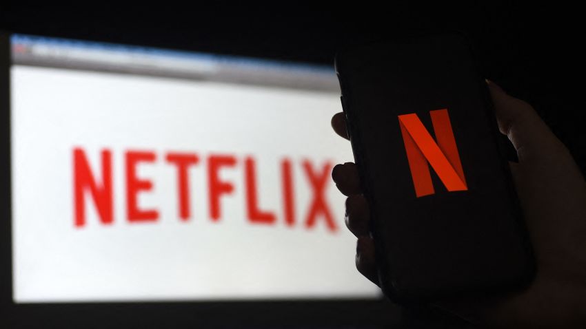 In this photo illustration a computer and a mobile phone screen display the Netflix logo on March 31, 2020 in Arlington, Virginia. - According to Netflix chief content officer Ted Sarandos, Netflix viewership is on the rise during the coronavirus outbreak. (Photo by Olivier DOULIERY / AFP) (Photo by OLIVIER DOULIERY/AFP via Getty Images)