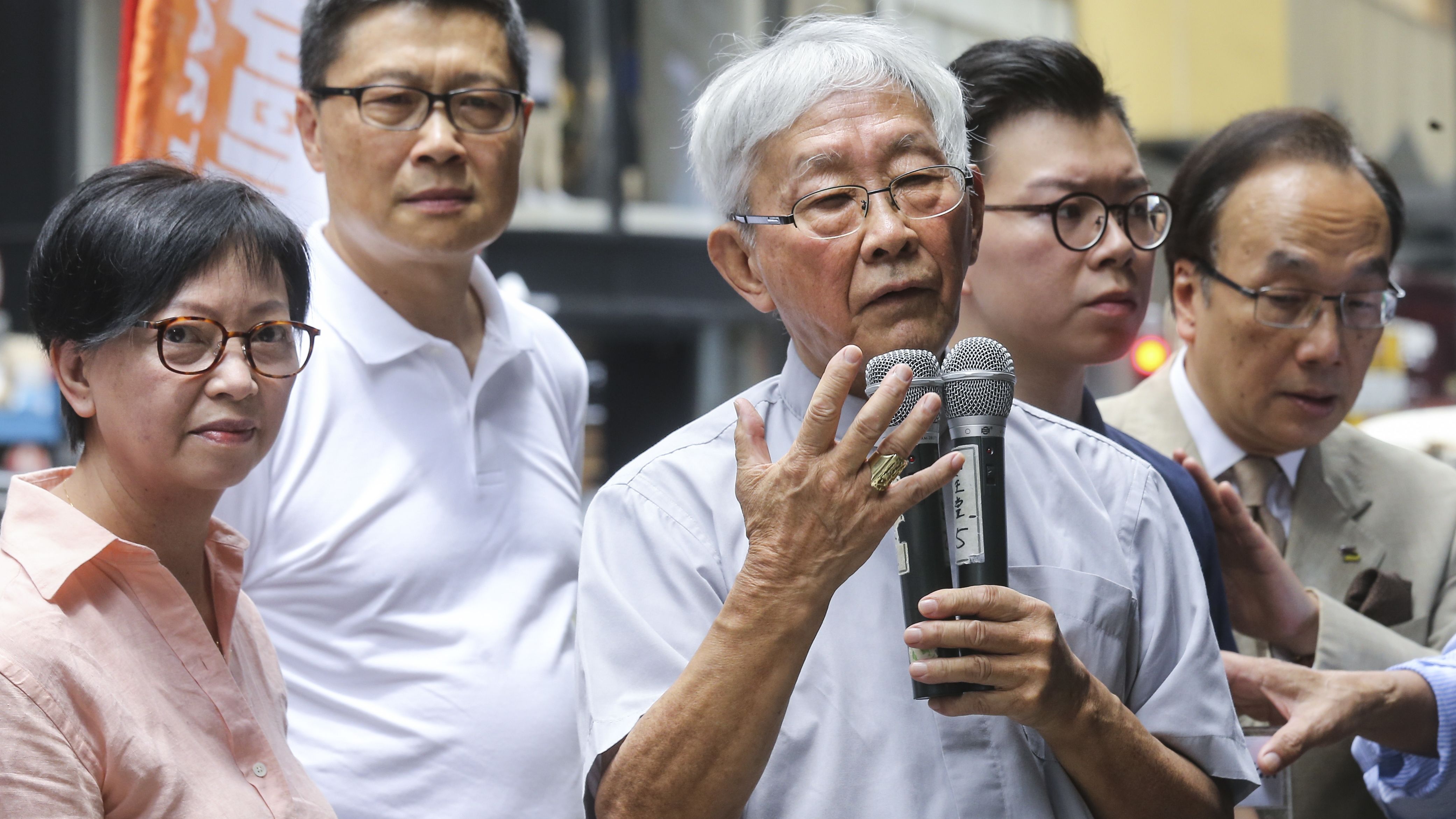 Cardinal Joseph Zen Ze-kiun (centre) was arrested by Hong Kong's national security police on Wednesday.