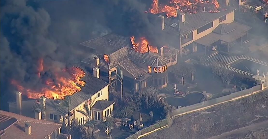 Multiple homes were burning in the area.