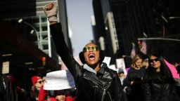 A woman shouts as she attends the Womens March on New York City on January 20, 2018 in New York City.