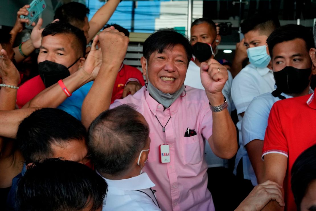 Presidential candidate Ferdinand "Bongbong" Marcos Jr. celebrates as he greets the crowd outside his headquarters in Mandaluyong, Philippines on May 11.