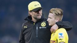 DORTMUND, GERMANY - MARCH 26: Borussia Dortmund's coach Juergen Klopp and Marco Reus after the 0-0 result in the Bundesliga match between Borussia Dortmund and FC Schalke 04 at Signal Iduna Park on March 26, 2014 in Dortmund, Germany. (Photo by Alexandre Simoes/Borussia Dortmund via Getty Images)