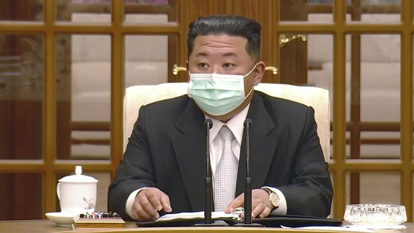 In this image made from video broadcasted by North Korea's KRT, North Korean leader Kim Jong Un wears a face mask on state television during a meeting acknowledging the country's first case of COVID-19 Thursday, May 12, 2022, in Pyongyang, North Korea. North Korea imposed a nationwide lockdown Thursday to control its first acknowledged COVID-19 outbreak after holding for more than two years to a widely doubted claim of a perfect record keeping out the virus that has spread to nearly every place in the world. (KRT via AP)