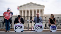 WASHINGTON, DC - MAY 11:  Led by Rev. Patrick Mahoney (2nd from R), a small group of anti-abortion activists kneel and pray in front of the U.S. Supreme Court on May 11, 2022 in Washington, DC. On Wednesday, the Senate failed to advance the Womens Health Protection Act, a Democrat-led bill that would effectively codify a right to an abortion nationwide. (Photo by Drew Angerer/Getty Images)