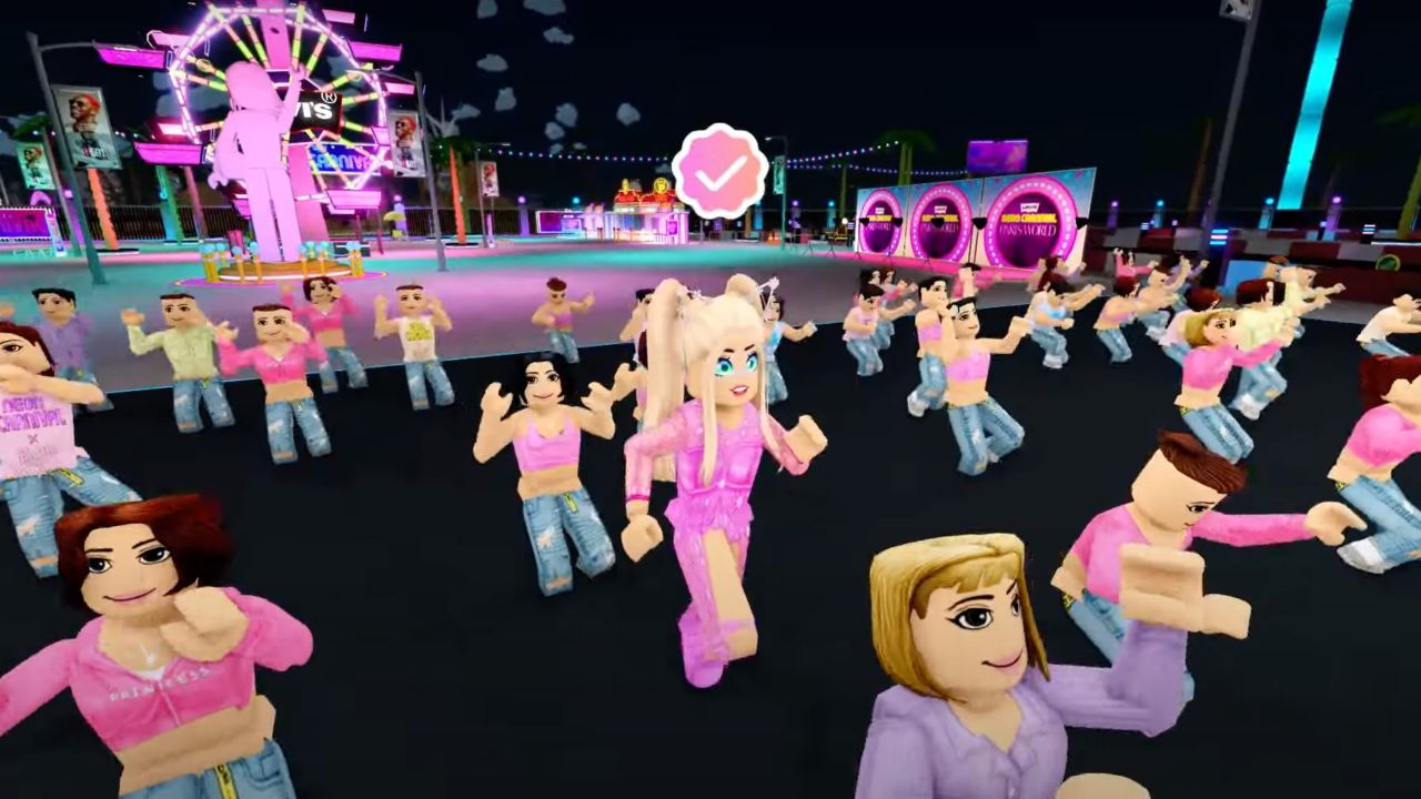 Paris Hilton's avatar joins a dance party at the Neon Carnival in Paris World on Roblox, the virtual gaming platform