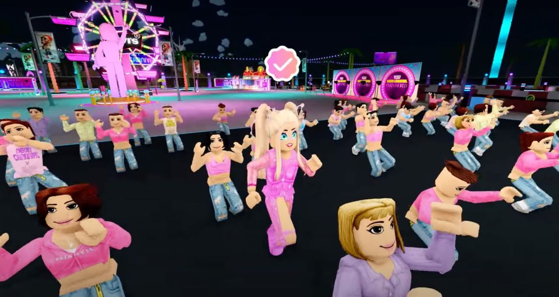 Paris Hilton's avatar joins a dance party at the Neon Carnival in Paris World on Roblox, the virtual gaming platform
