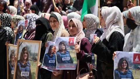 Palestinians take part in a demonstration following Abu Akleh's death.