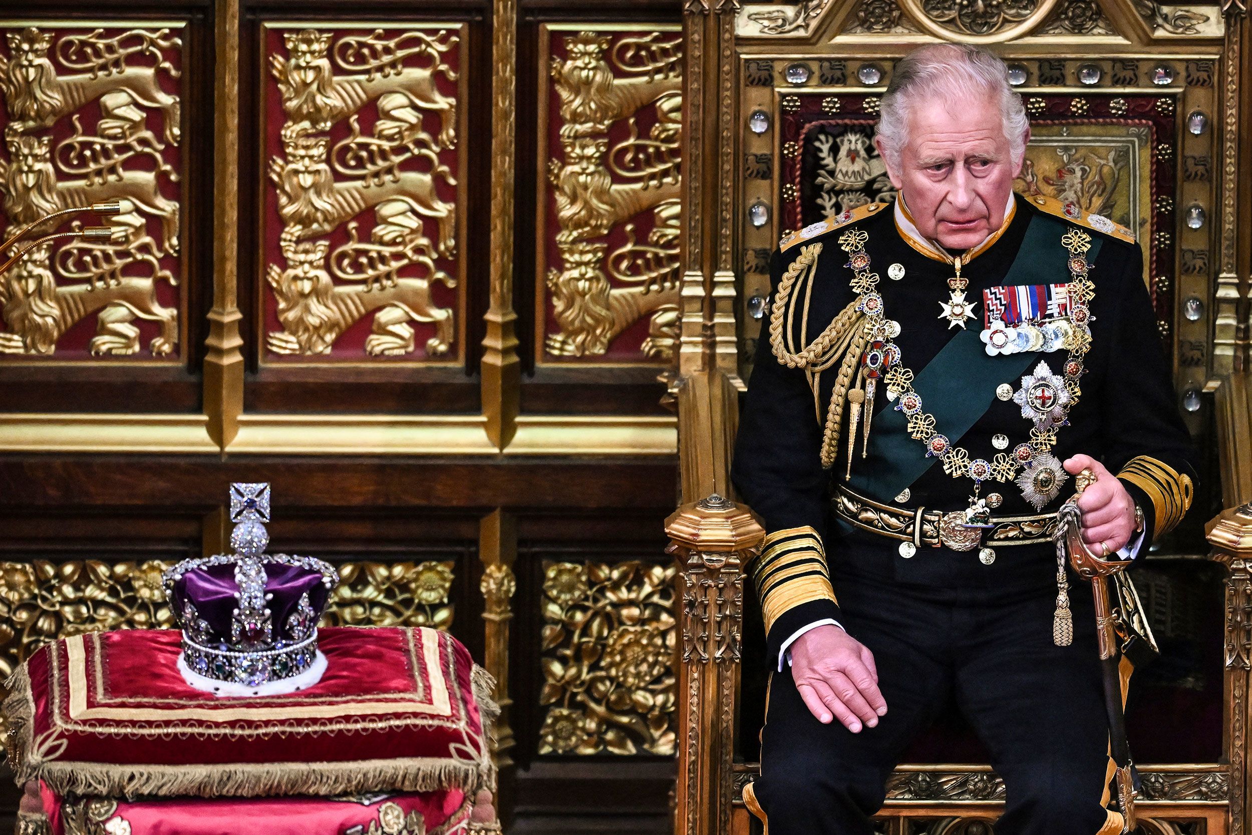 Britain's Prince Charles sits by the Imperial State Crown at the opening of Parliament on Tuesday, May 10. His mother, Queen Elizabeth II, missed the occasion for the first time since 1963.